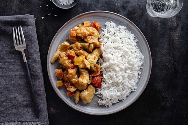 asian-food-chicken-fried-with-sauce-rice-served-plate