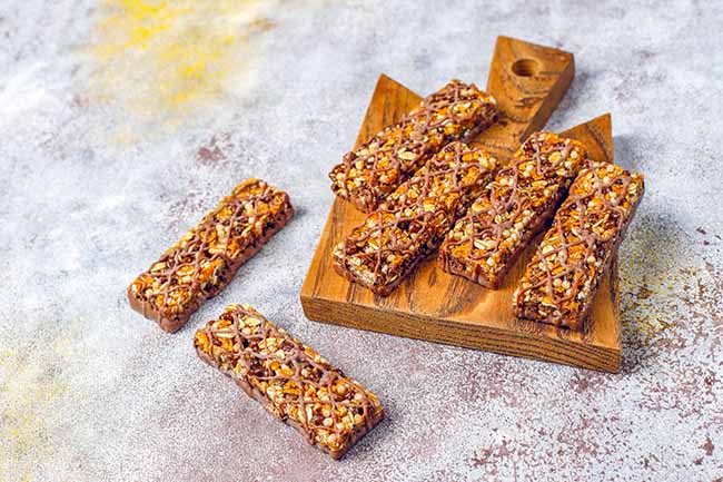 healthy-delicios-granola-bars-with-chocolate-muesli-bars-with-nuts-dry-fruits-top-view